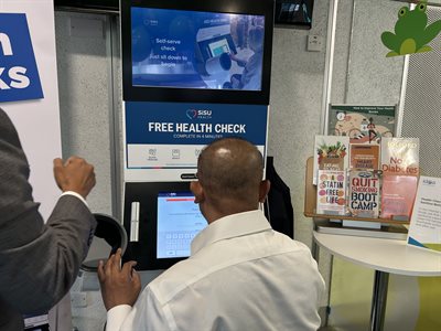 Cllr Hussain at the health kiosk