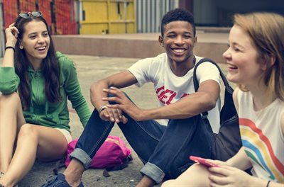 Teenagers sitting and laughing-3