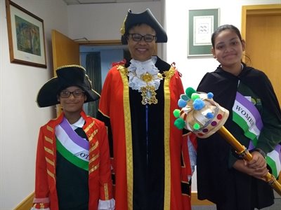 Bigland Green Primary School students Suhaib and Anonna with Speaker of the Council, Councillor Victoria Obaze