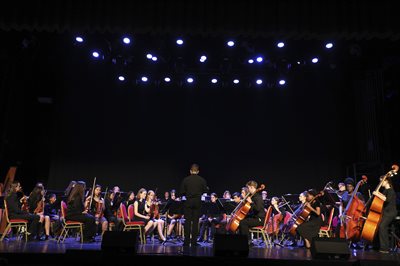 full orchestra under lights