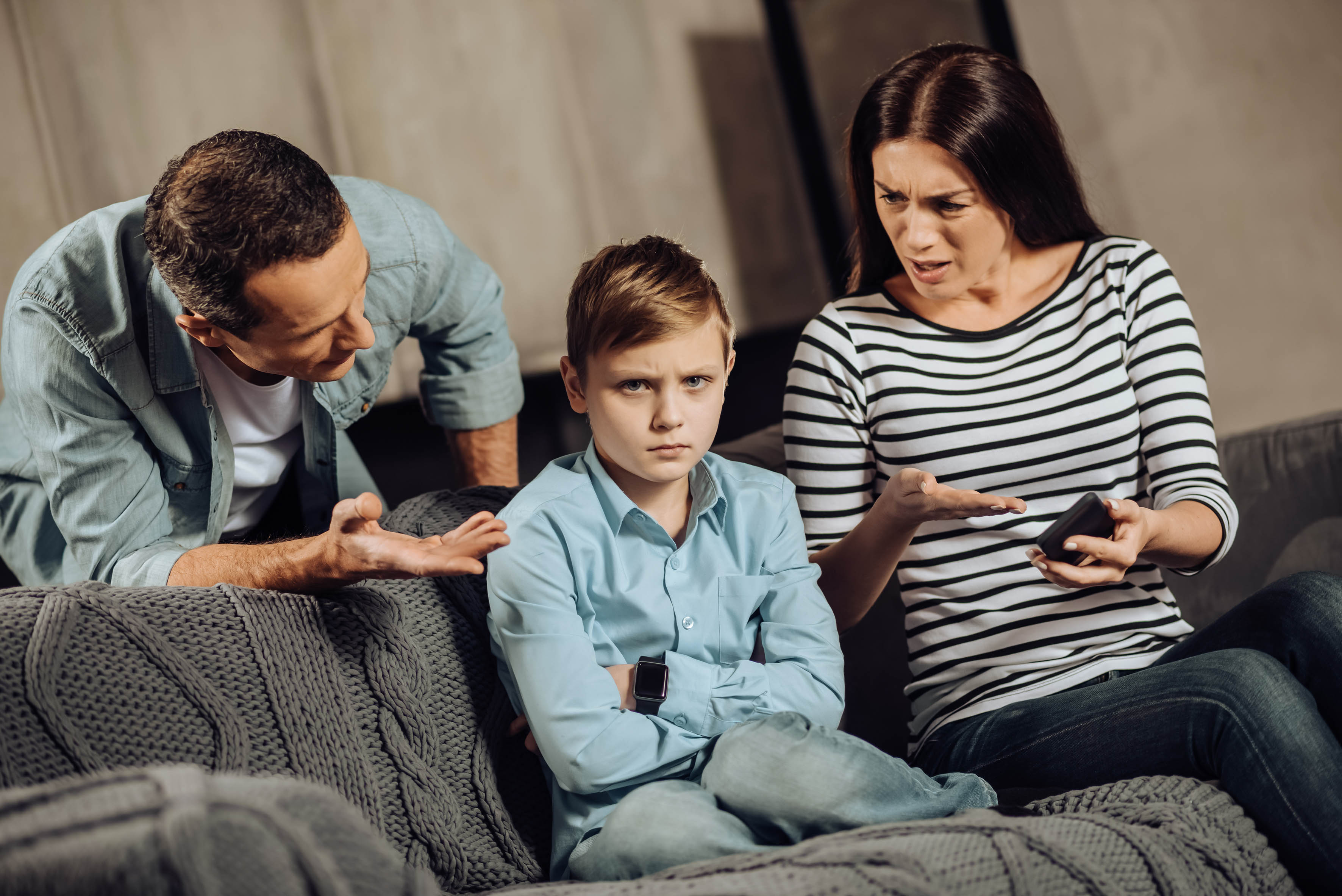 Angry child and parents