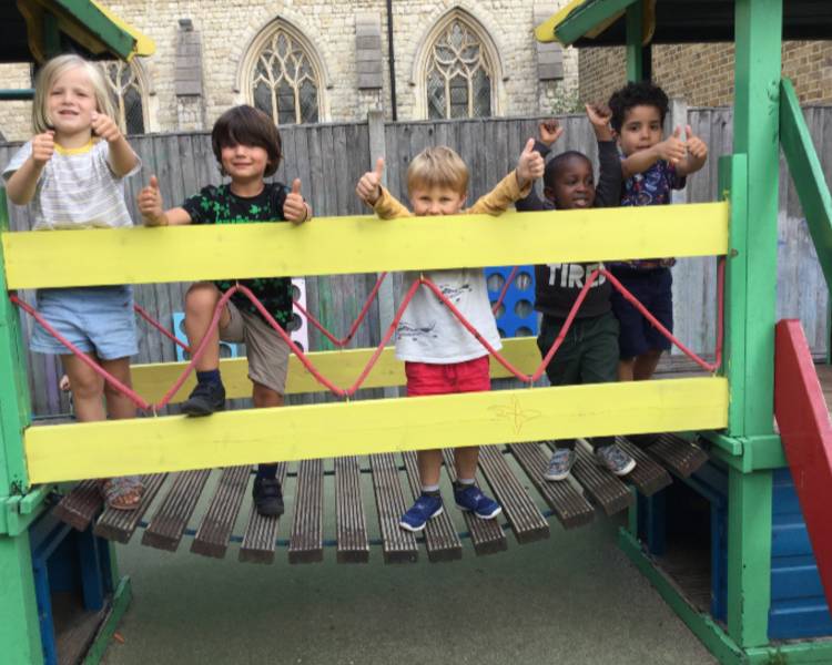 Children playing on play apparatus