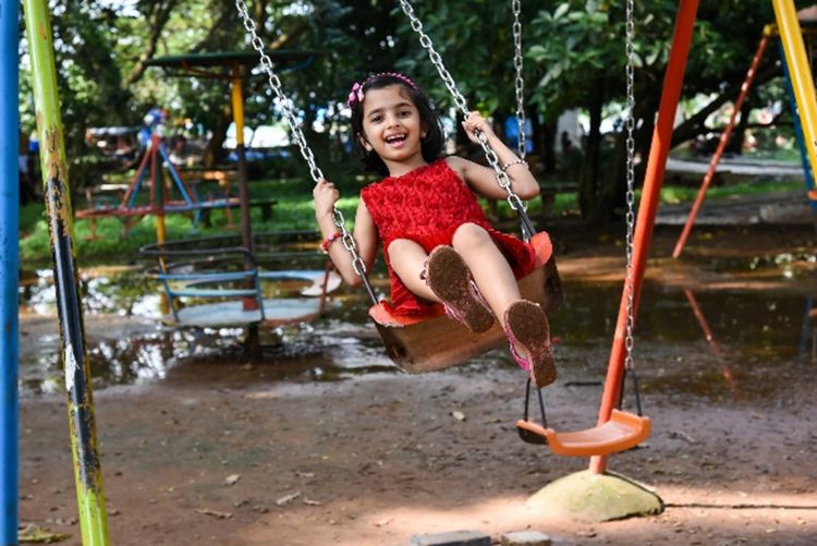 Girl on swing