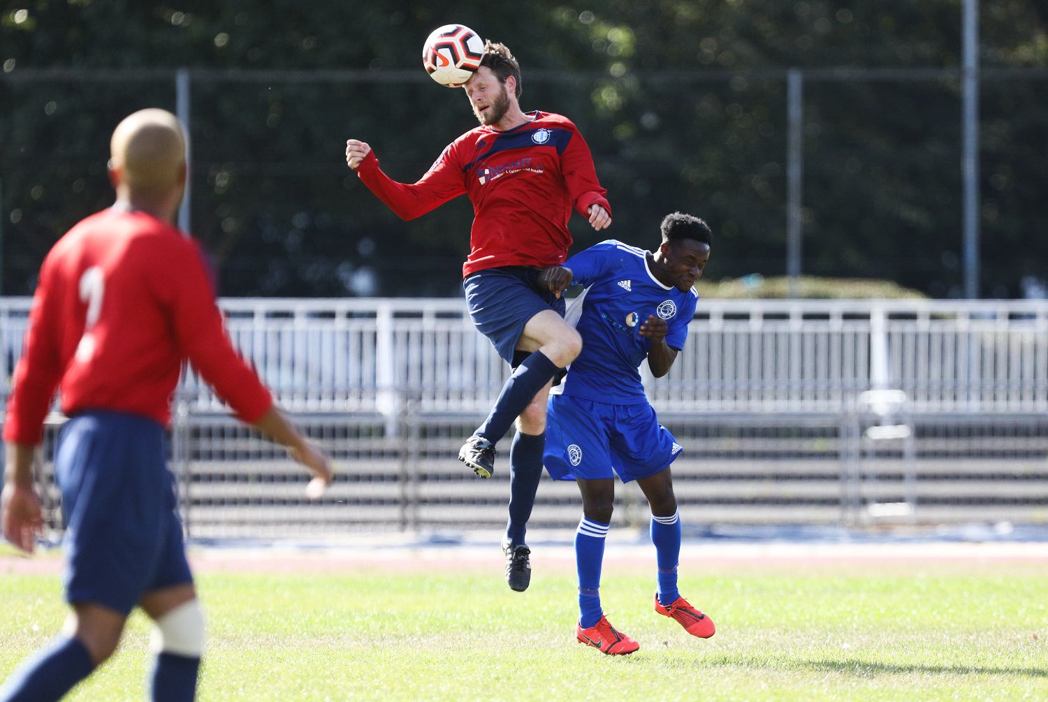 Footballer heading a ball