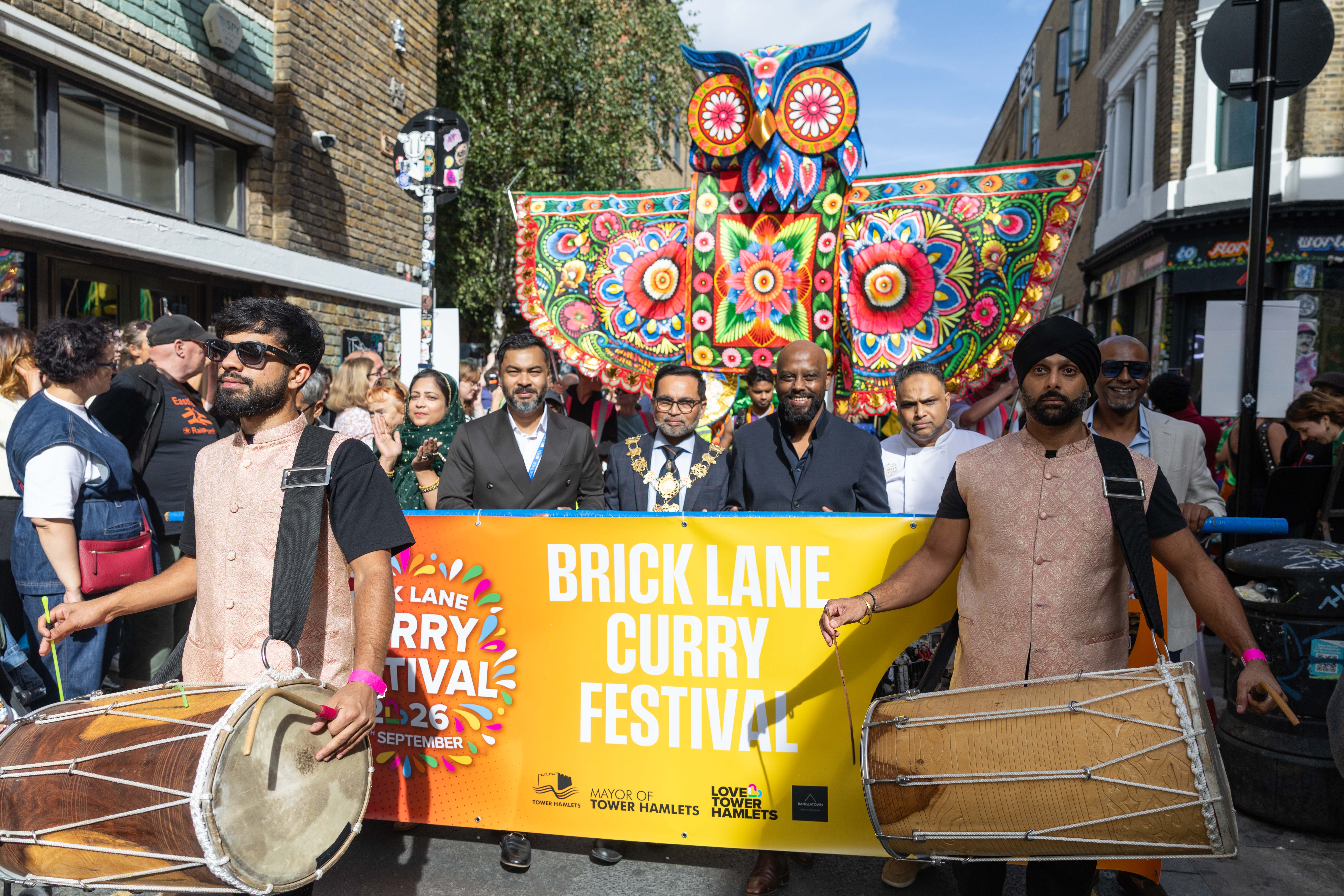 BLCF 2026 - Dhol drummers, dignitaries, and a giant owl lead the festival procession