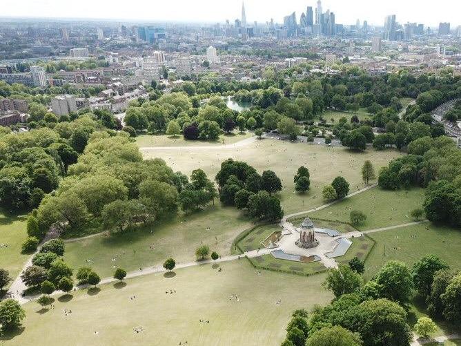 Aerial view of Victoria Park featuring the skyline of London